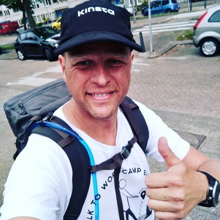 A Kinsta team member walking to WordCamp Europe